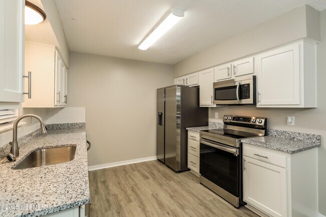 Building Photo - 6349 Faulkner Dr