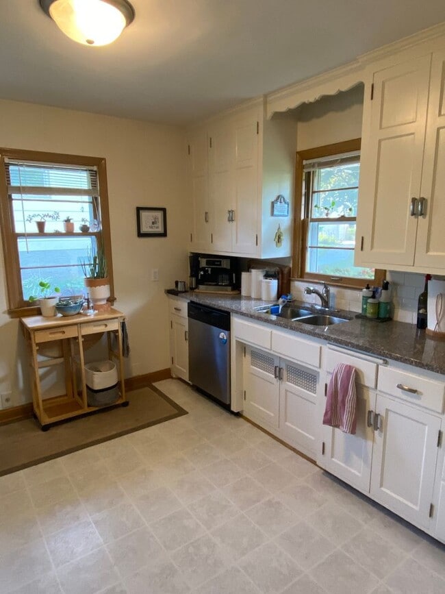 Building Photo - Charming NE Home w/ Two Car Garage