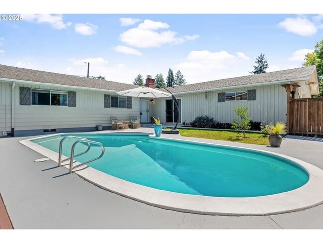Building Photo - Charming 4-Bed Ranch Home with In-Ground P...