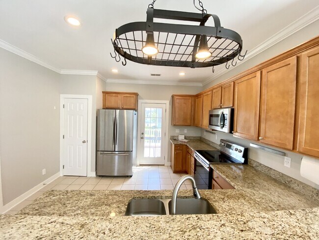 Building Photo - Spacious End Unit, Four Bedroom Townhouse in Cypress Ridge!