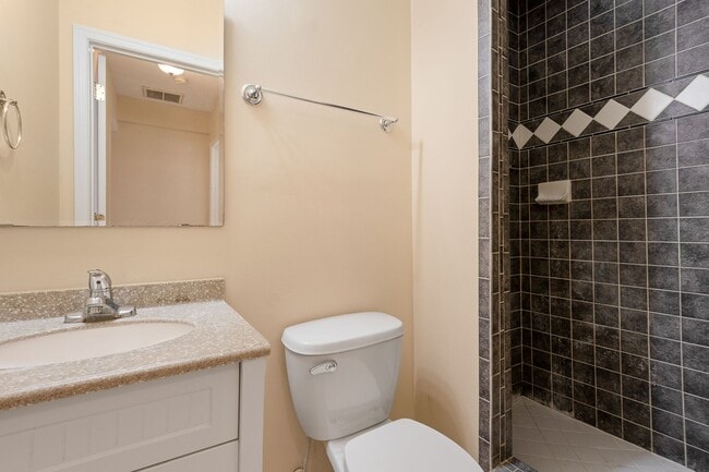 Building Photo - Spacious 2BR/2.5BA Townhome with Finished Basement & Extra Storage