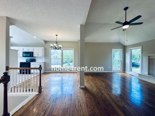 Building Photo - Brand New Paint, Wood Floors, Walkout Fini...