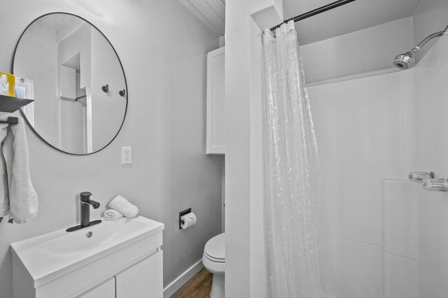 bathroom and stall shower - 3525 N Poinsettia Ave