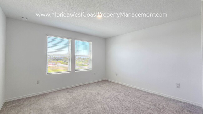 Building Photo - OUTSTANDING BRAND NEW TOWNHOME! SKYE RANCH...
