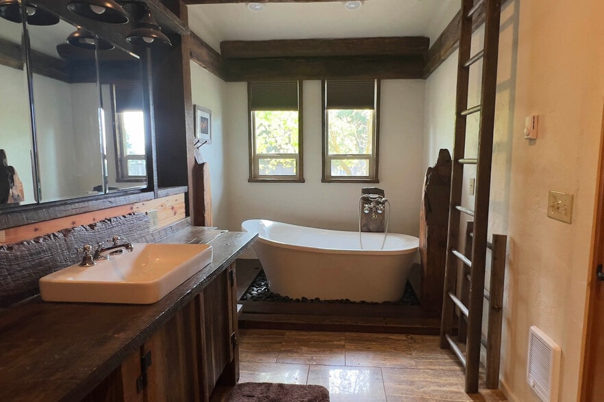 Bathroom with large tub - 3575 N Brookside Ln