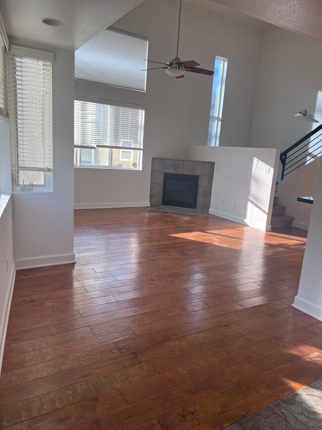 Living area with fireplace - 14907 Moorpark St