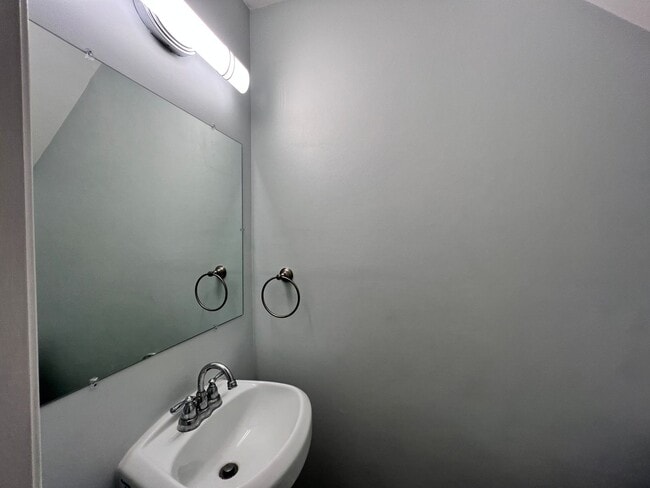 Building Photo - Three-bedroom, two-and-a-half bathrooms in...