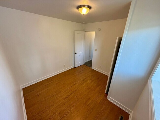 Building Photo - For Rent: 2 Bedroom, 1 Bathroom Home with Garage and Large Yard