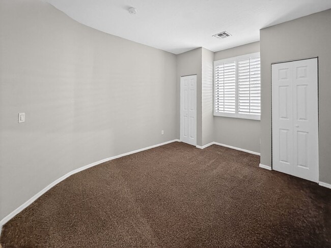Building Photo - Single-level 4 bed, 2 bath home with tandem 3-car garage and RV gate.