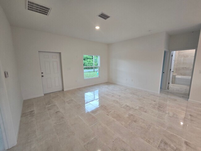 Building Photo - BRAND NEW 3/2/1 -SW LEHIGH ACRES FL