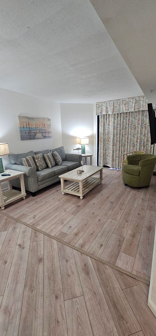 Building Photo - Beach Living at Its Finest – Fully Furnished 1BR/1BA Condo | All Utilities Included