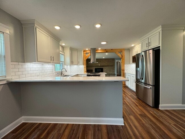 Building Photo - Exquisite Brick Ranch with Modern Upgrades, Countryside Charm And Two Car Garage