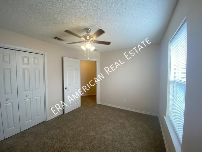 Building Photo - 7418 Woodmont Rd