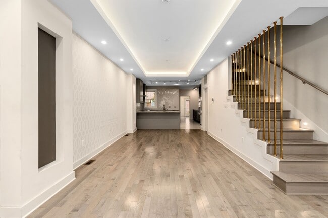 Building Photo - Experience stunning design and modern finishes in Columbia Heights!