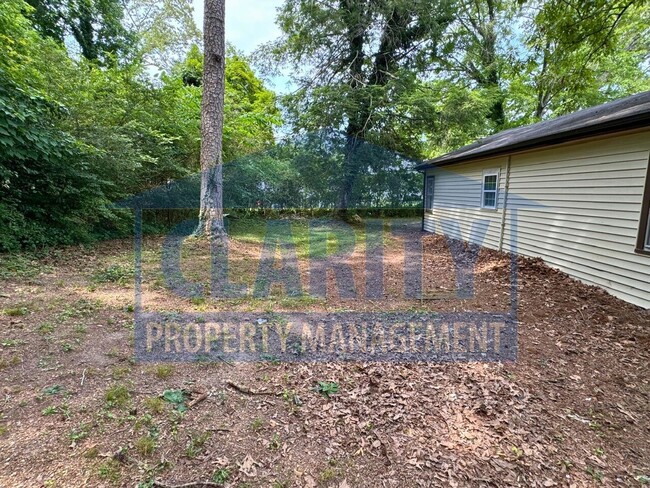 Building Photo - Two bedroom home w/ wrap-around porch!