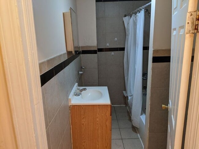 Building Photo - Three-Bedroom Apartment Near Public Transportation