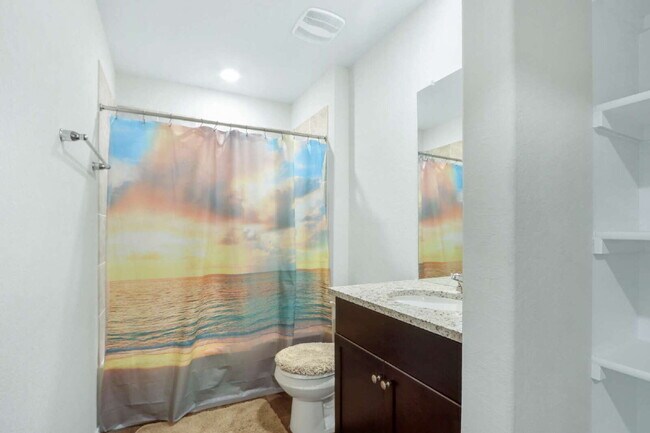 Building Photo - "Charming 4-Bedroom Retreat with Spacious ...