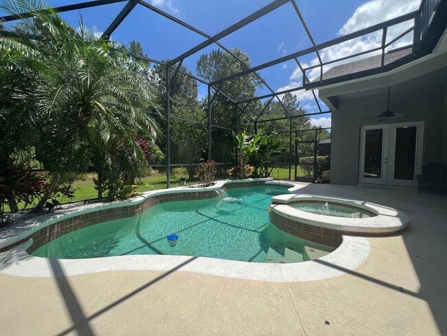 Building Photo - Beautiful 5 Bed 4 Bath Pool Home in the gu...