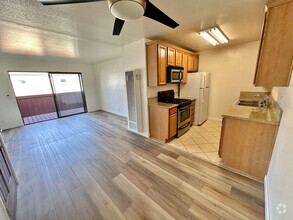 Building Photo - End unit condo with garage and additional ...