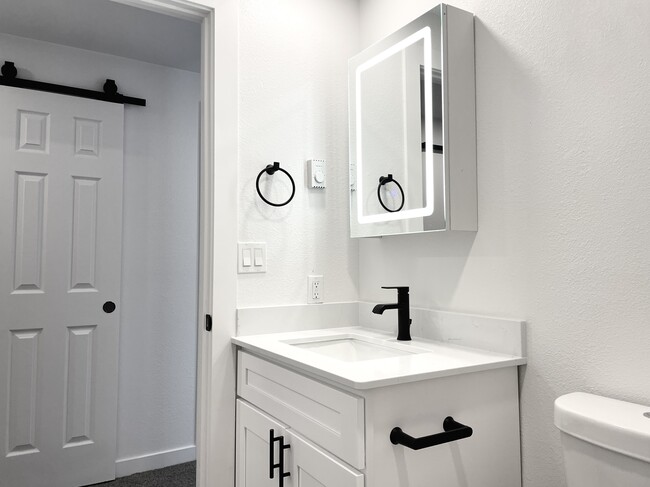 Lighted vanity in both bathrooms - Rosedale Townhomes