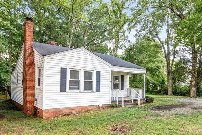 Building Photo - Adorable Home, Just Painted, Wood Flooring...