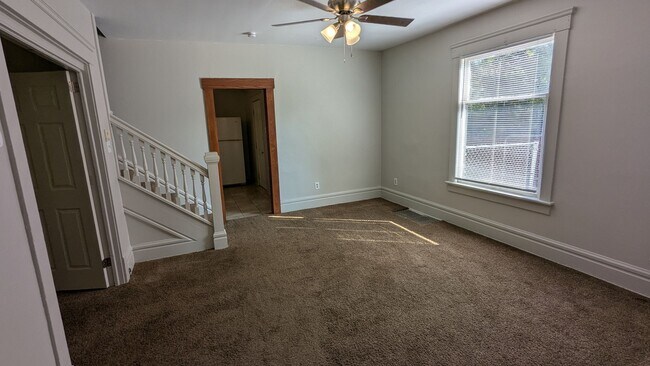 Building Photo - Come live in a charming 3-bedroom house in...