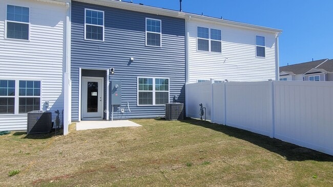 Building Photo - Beautiful New Townhome for Military Tenant
