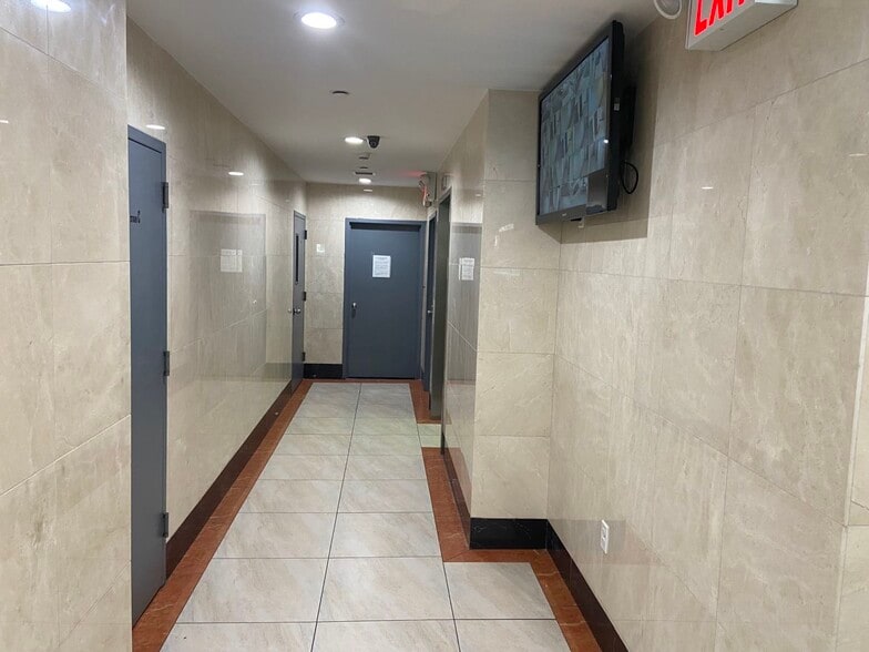 Lobby w/ Surveillance - 9411 65th Rd