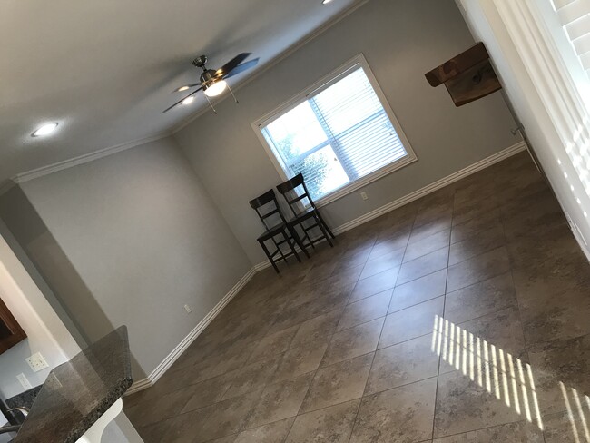 spacious living room that leads into the breakfast area/kitchen - 606 South A Ave.