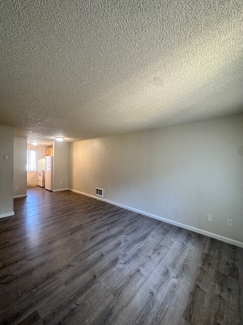 Building Photo - 2-Bedroom, First Floor Corner Unit with Laminate Flooring