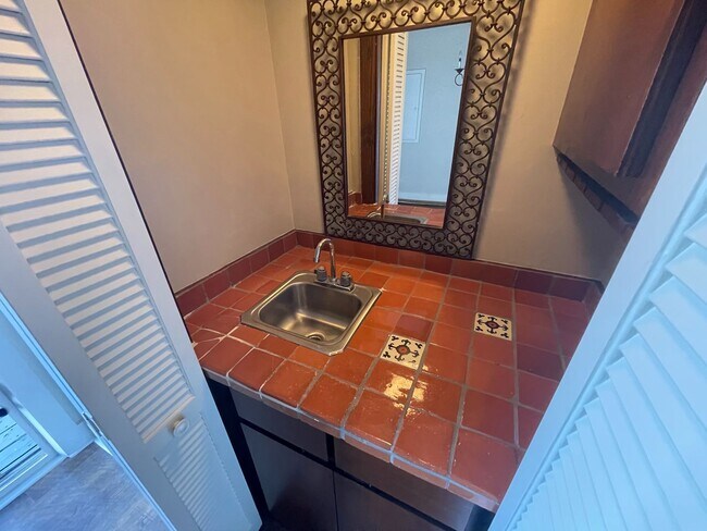 Building Photo - 3 Bedroom 3 Bath Beauty on Golf Course with Wet Bar and Storage Building