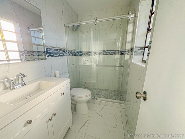 Building Photo - 10687 Royal Palm Blvd