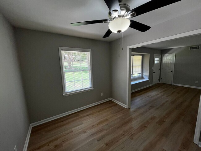 Building Photo - Must See the Sunroom off the Primary Bedroom!