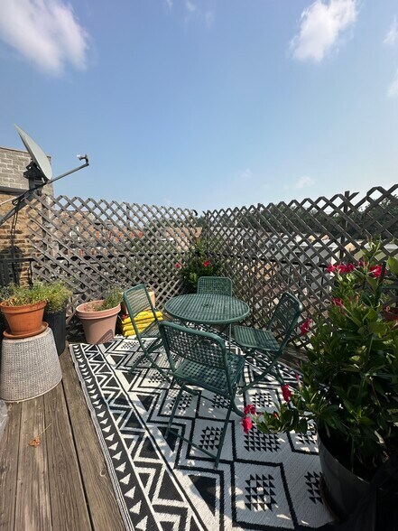 Primary suite balcony with access from bedroom - 2651 W Haddon Ave
