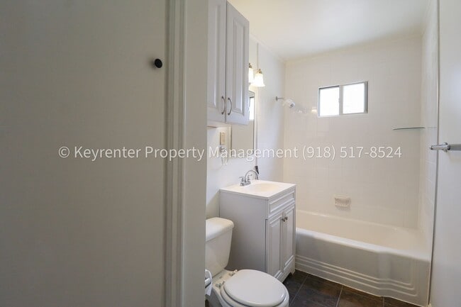 Building Photo - Gorgeous duplex unit on large lot with garage -- NO PETS ALLOWED