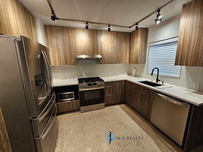 Building Photo - Classy Modern Renovation Home... true 3/2 ...