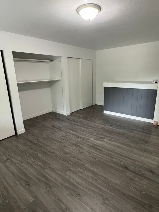 Building Photo - Spacious Two Story (2BR/1BA) Home with Large Fenced-In Yard