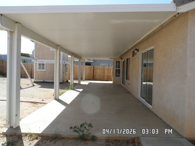 Building Photo - 3 Bedrooms, 2 Bathrooms, approx. 1392 sq. ft., 2 Car Garage, Covered Patio, Fenced, Play house,