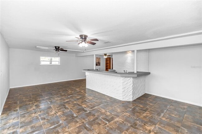 Building Photo - 8315 Village Green Rd