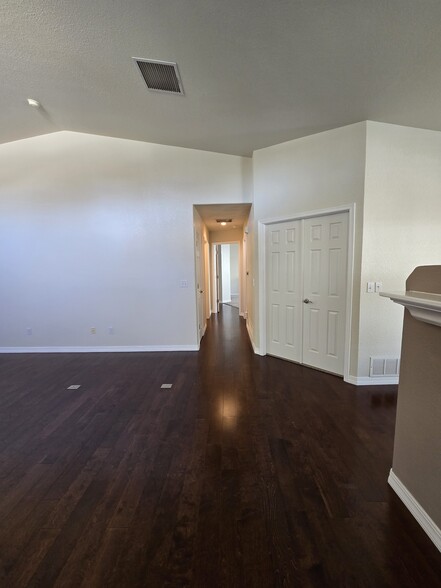 View from living room down hall to bedrooms and bathrooms - 726 W Tyrolean Ct