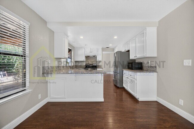Building Photo - Spacious 4-Bedroom Retreat with 2.5 Baths