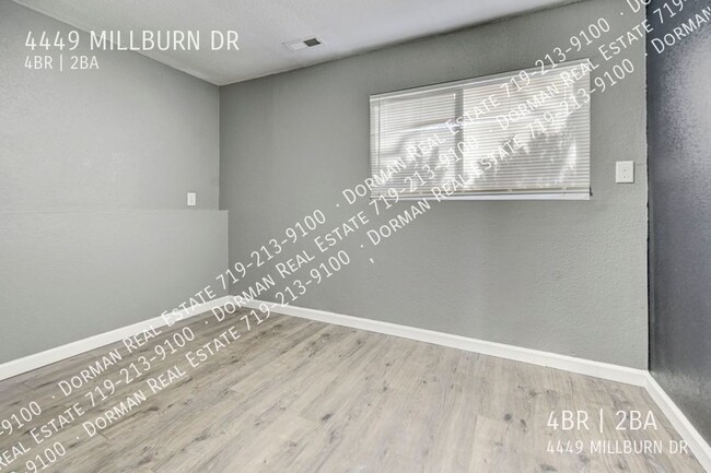 Building Photo - Four bedroom home close to Ft. Carson, Lar...