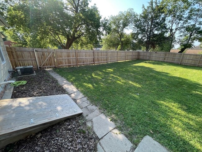 Building Photo - New Appliances + HUGE Fenced Backyard