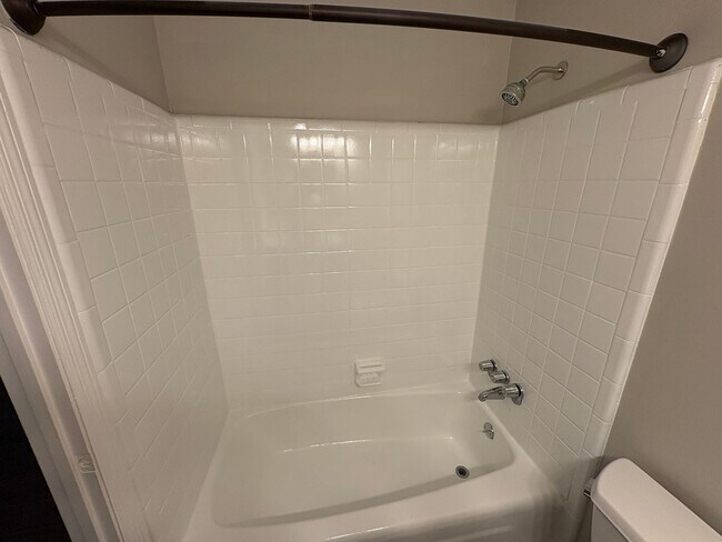 Building Photo - Four Bedroom Townhome Available Now
