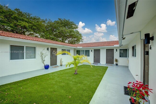 Building Photo - 1750 NE 56th Ct