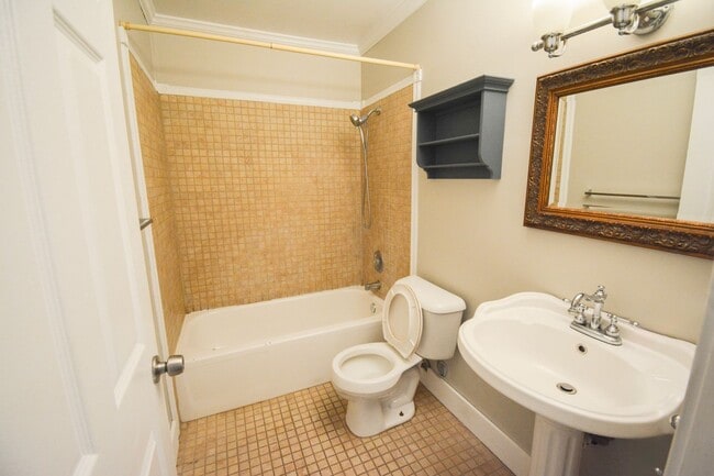 Building Photo - Main floor condo with great patio & many u...