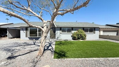 Building Photo - 8608 E Vernon Ave