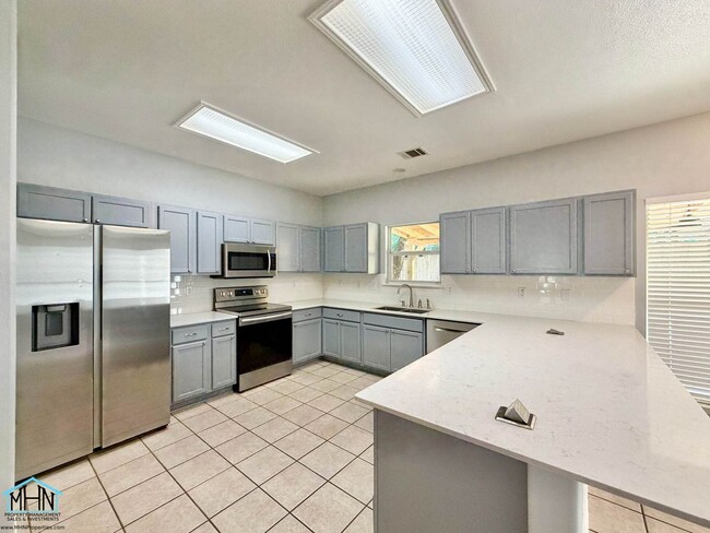 Building Photo - Beautiful and Spacious 2 story 4 Bedroom 2.5 Bath Home Designed for Comfortable Living and Seamle...