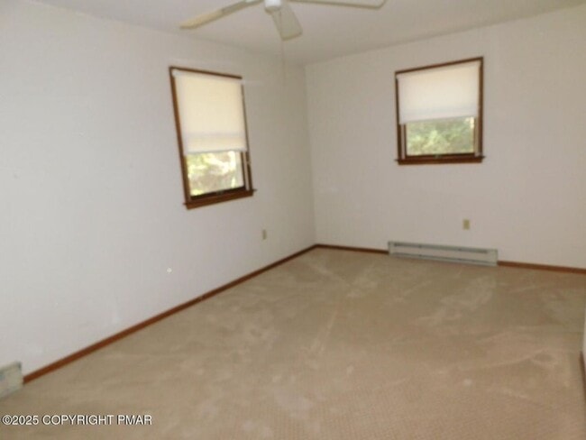 Building Photo - 3-bedroom, 2-bath home featuring an open f...