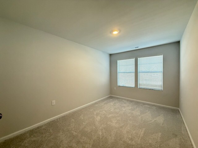 Secondary Bedroom with Blinds - 266 Peebles Dr